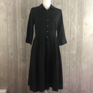 Black button down dress.
